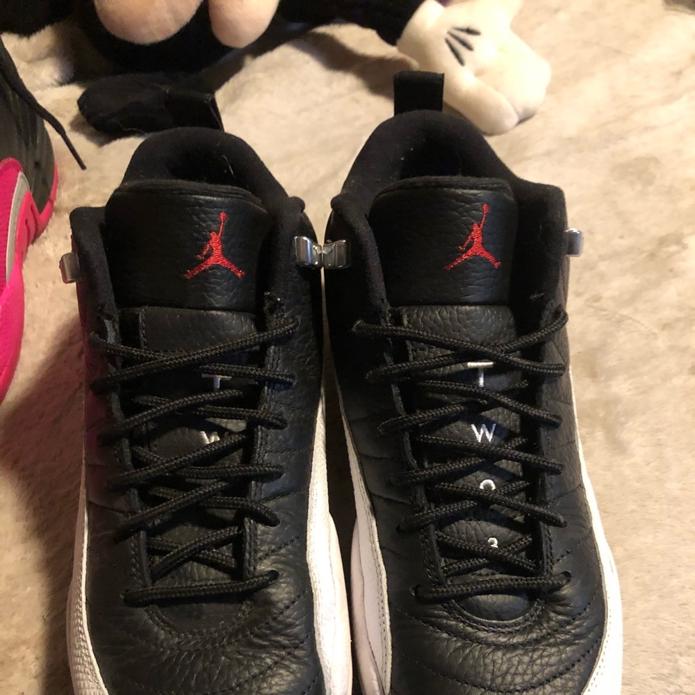 Black and white Jordan 12s